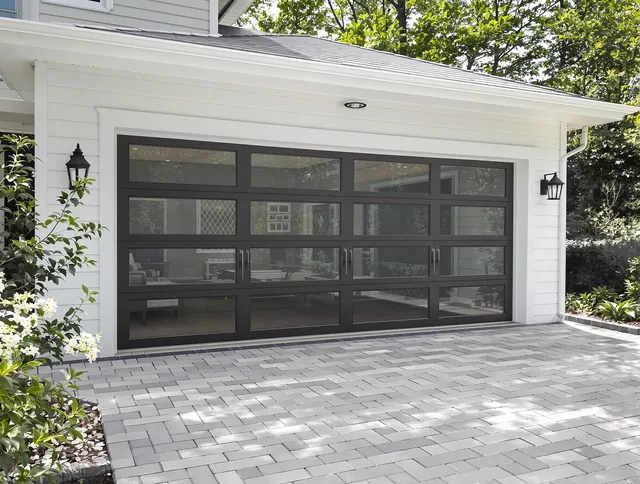 Duxbury Garage Door Repair design specialist presenting custom garage door options to Duxbury homeowner