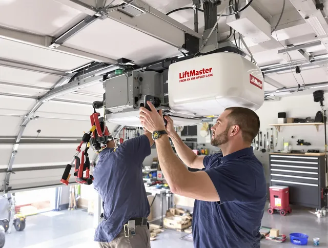 Duxbury Garage Door Repair technician performing advanced diagnostics on garage opener in Duxbury