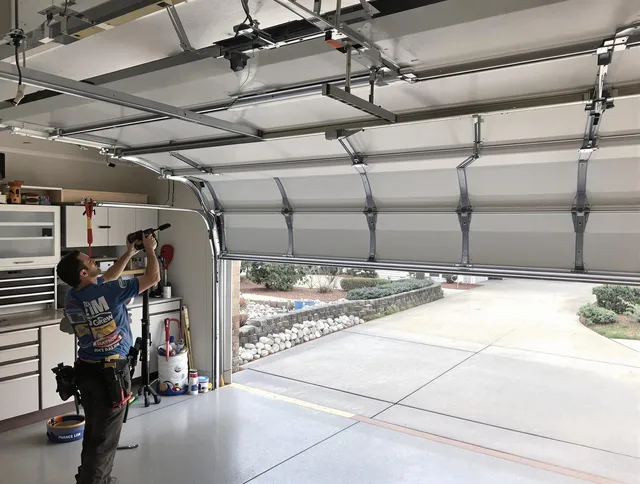Garage door track repair service by Duxbury Garage Door Repair in Duxbury